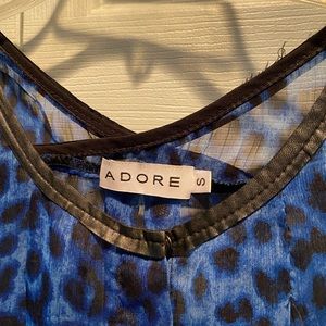 Sleeveless animal print black and blue blouse